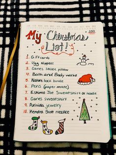 a christmas list is shown on a black and white blanket