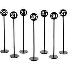 the number twenty seven stands are numbered in black and have numbers on each one side