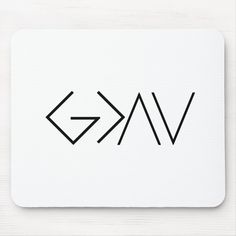 a white mouse pad with the word vak written in black ink on top of it