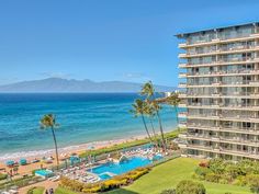 an aerial view of the beach and ocean from a high rise building in waikiki