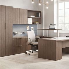 an office with a desk and chair in it