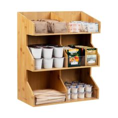 a wooden shelf filled with lots of containers and food on top of eachother