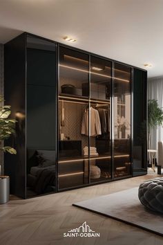 an image of a bedroom setting with closets and furniture in the room that is well lit