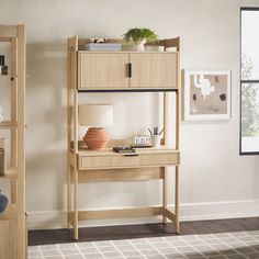 a wooden shelf with a lamp on top of it