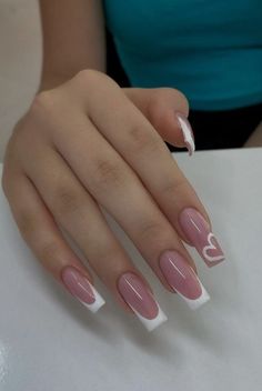 a woman with pink and white nail polish on her nails