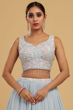 Buy Powder Blue Sequins Embroidered Raw Silk Designer Lehenga Online | Samyakk Lengha Blouse Designs, Sleeveless Blouse Designs, Long Skirt And Top, Simple Frock Design, Crop Top Lehenga, Lehenga Designs Simple, Latest Model Blouse Designs, Fashionable Saree Blouse Designs, Lehenga Blouse Designs