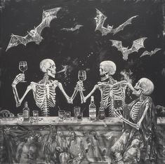 three skeletons sitting at a table with wine glasses in front of them and bats flying overhead