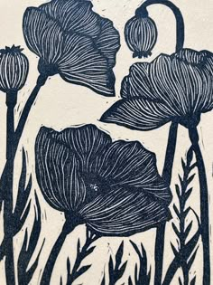 black and white drawing of flowers in the grass