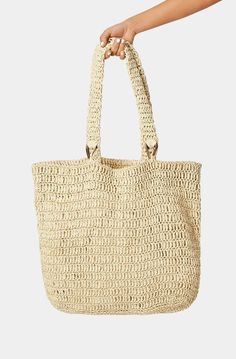 The Billini Ocean Tote Bag is the perfect companion for beach trips. This chic and stylish bag is made of natural raffia and is perfect for storing all your beach day essentials. With its large size and comfortable handles, it is a great bag for a relaxed day at the beach. Casual Everyday Bags Made Of Natural Fiber, Chic Summer Bags Made Of Natural Fiber, Chic Beach Bag Made Of Natural Fiber, Casual Natural Color Natural Fiber Bag, Casual Natural Color Bag With Natural Fiber, Casual Natural Fiber Bag In Natural Color, Casual Natural Fiber Bags In Natural Color, Beachy Natural Color Shoulder Bag For Everyday, Beige Natural Fiber Summer Bags