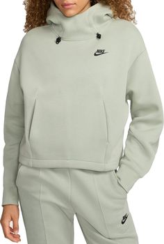 Setting the bar for premium warmth and polished comfort since 2013, Tech Fleece is entering a new era. With an emphasis on tailored elegance, this slightly cropped hoodie has an easygoing and elevated feel. Nike's premium, lightweight fleece–smooth both inside and out–gives you plenty of warmth without adding bulk. Fit & Design: Oversized fit: exaggerated and spacious A roomy design mixed with dropped shoulders and loose arms gives you a relaxed vibe without feeling too big Extended neck and darts in the front and back add structure and dimension to your look Kangaroo pocket gives you somewhere to put your hands when they get chilly Screen-printed Futura logo Entering A New Era, Sporty Hoodie, Womens Oversized Hoodie, Tech Fleece Hoodie, Nike Sportswear Tech Fleece, Favorite Leggings, Tops Nike, Women's Sportswear, Nike Tech Fleece