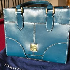 Questions? Leave A Comment Below! Dark Teal Handbag, Dooney And Bourke, Dooney & Bourke Bags, Dooney & Bourke, Dark Teal, Dooney Bourke, Teal Blue, Leave A Comment, Shoulder Bags