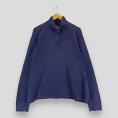 "REMINDER: THIS IS USED CLOTHING PLEASE DO NOT EXPECTED IT LIKE TO BE NEW OR IN PRISTINE CONDITION Feel free to contact me for any question. I'll assist you with my pleasure. Vintage RALPH LAUREN Polo Half Zipper Sweater Large 90's Ralph Lauren Small Pony Jumper Polo Sport Pullover Faded Blue Sweatshirt Size L *All measurements are taken with the garment flat on the ground. SIZE ON TAG :- Size L  ACTUAL SIZE MEASUREMENT :- ARM PIT TO ARM PIT :- 25\" inches BACK COLLAR TO HEM :- 26\" inches CONDITION :- GREAT USED CONDITION. NO HOLES AND STAINS. ** WE ARE USING DHL EXPRESS, IT TAKES 3-5 WORKING DAYS ONLY TO ARRIVE. PLEASE LEAVE YOUR PHONE NUMBER ON THE NOTE WHILE MAKE A PURCHASE** REF : (16-06-2021) 1182" Half Zipper Sweater, 90s Ralph Lauren, Zipper Sweater, Zippered Sweater, Vintage Ralph Lauren, Polo Sport, Blue Sweatshirt, Ralph Lauren Polo, Used Clothing