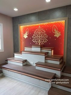 the stairs are decorated with gold and red designs on them, along with wooden steps