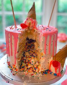 a birthday cake with ice cream and sprinkles