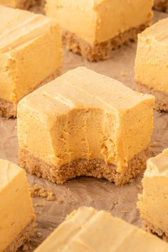 several pieces of cake sitting on top of parchment paper