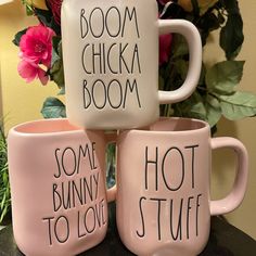 three coffee mugs that say boom chicka boom and some bunny to love