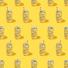 a yellow background with many cans of sodas and one has a candle in it