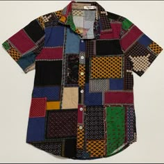 Amazing Patchwork-Like Button Down Shirt. Tagged Size Large, But More Like A Men’s Small!! Would Be An Amazing Shirt To Wear Tied Into A Crop Top Short Sleeve Men’s Small All Buttons Intact Measurements: Top Of Collar To Bottom Of Shirt: 27 1/4” Shoulder To Shoulder: 15” Arm Hole: 6 5/8” Memory Crafts From Clothes Shirts & Tops, Cheap Playful Button-up Shirt, Cheap Multicolor Print Patchwork Tops, Affordable Playful Button-up Shirt, Funky Mens Outfits, Casual Patchwork Patterned Shirt, Colorful Button Up, Casual Button-up Tops With Patchwork, Black Patchwork Button-up Top