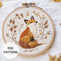 an embroidery pattern with a fox on it