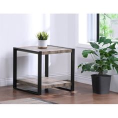 This coffee table features a minimalist design with smooth lines, giving it a modern feel and making it a stylish centerpiece in any living room. 17 Stories | 17 Stories 1Pc Contemporary End Table w / Storage Shelf Rustic Brown Finish Living Room Wooden Furniture brownWood / Metal in Brown / Gray | 23.5" H X 23.5" W X 23.5" D | Wayfair Living Room Wooden Furniture, Contemporary End Tables, End Table With Storage, Living Room End Tables, End Tables With Storage, Rustic Living, Rustic Living Room, Table With Storage, Rustic Brown