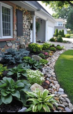 a house with landscaping in front of it