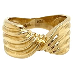 Vintage 1980's 14k Yellow Gold Twist Ribbon Design Statement Ring. The width of the ring is 9.8mm and tapers to 3.5mm wide. The finger size is 6 and it can be sized upon request. The ring weighs 5.35g. School Rings, Twisted Ribbons, Vintage Gold Rings, Robert Lee Morris, Phoebe Buffay, Gold Statement Ring, Vintage Style Rings, Design Statement, Acid Wash Jeans