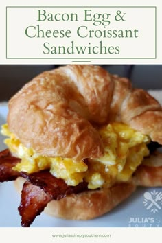 bacon egg and cheese croissant sandwiches on a white plate with text overlay