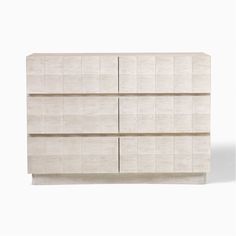 the sideboard is made out of white wood