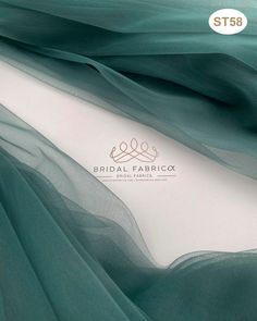 ⭐ Color Code: ST58 🌈 Color: Greyish Green 📏 WIDTH: 118" / 300 cm - https://bridalfabrica.etsy.com/listing/1175153406 Premium Soft Tulle Fabric Discover our luxurious soft tulle fabric with a generous width of 118 inches (300 cm), made from high-quality threads that create a refined, elegant drape. This silk mesh-like fabric offers excellent flexibility and is highly resistant to both sewing and embroidery, ensuring your projects stay intact over time. With its wrinkle-resistant properties, thi Magic Illusions, Flower Girl Gown, Bridal Jumpsuit, Illusion Tulle, First Communion Dresses, Silk Tulle, Alencon Lace, Designer Evening Dresses, Bridal Fabric