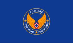 the flag of philippines with an eagle emblem on it's chest and wings in the center