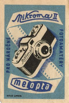 a blue and white stamp with a camera on it