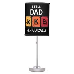 a lamp with the words i tell dad joke on it and an image of some type of chemical element