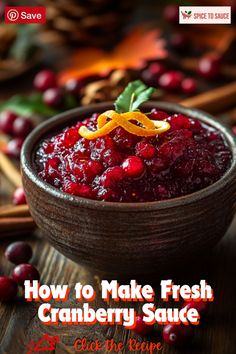 cranberry sauce in a wooden bowl with orange peels and leaves on top