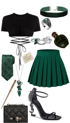 a green skirt and black shirt with accessories