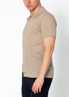 Introducing our Geometric Crochet Knit Polo, a sophisticated and stylish addition to your wardrobe. Crafted from high-quality crochet knit fabric, this polo shirt features a unique geometric pattern that adds a touch of modern flair. The crochet knit construction provides breathability and texture, making it ideal for warmer weather. The polo collar adds a classic touch, while the short sleeves offer comfort and versatility. With its tailored fit and attention to detail, this polo shirt is perfe Collared Jacquard Knit Top, Jacquard Knit Collared Top, Summer Knit Polo Sweater, Fitted Polo Sweater With Textured Knit And Short Sleeves, Fitted Jacquard Knit Polo Collar Top, Fitted Jacquard Knit Polo Top, Fitted Jacquard Knit Top With Polo Collar, Fitted Short Sleeve Textured Knit Polo Sweater, Beige Jacquard Knit Top