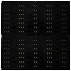 a black surface with white dots on it