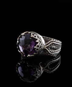 Looking for the perfect gift for your girlfriend, wife, mother, or sister? This gorgeous silver filigree art women's cocktail ring is the ideal choice. With its intricate details and beautiful face-up design, this ring is sure to stand out and make an impression. It features a double-sided, faceted checkerboard round-cut amethyst gemstone that measures 10mm and has a face size of 0.47 inches (12.00mm) in width. Not only is this ring stunning, but it also comes with a velvet pouch, silver polish Luxury Amethyst Ring With Intricate Design, Exquisite Amethyst Ring With Accent Stones, Exquisite Silver Amethyst Ring For Wedding, Elegant Amethyst Open Ring For Wedding, Elegant Open Amethyst Ring For Wedding, Elegant Silver Crystal Ring With Birthstone, Elegant Amethyst Ring For A Gift, Formal Silver Engraved Ring With Birthstone, Elegant Silver Crystal Birthstone Ring