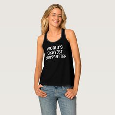 a woman wearing a black tank top that says world's okayest crossfitter