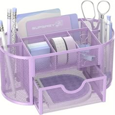 a purple desk organizer with pens, scissors and other office supplies