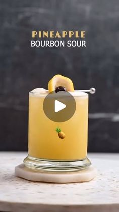 a pineapple bourbon sour recipe in a glass on a table with the caption pineapple bourbon sour