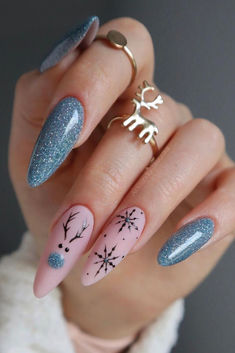 reindeer nail design on long almond nails with reindeer designs December Nails Christmas 2024, Nails December 2024, December Nails Designs, Cute December Nails, December Nails Ideas, Snow Nail Art, Christmas Nails Glitter, Nails December, Nail Art Noel