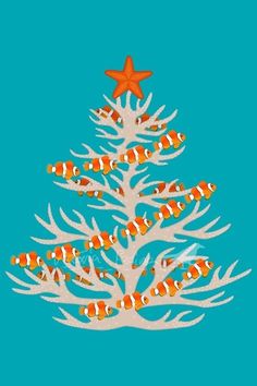 an orange and white christmas tree with clown fish on it's bottom, against a blue background