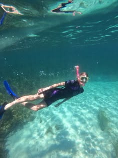 a person in the water with a snorkel