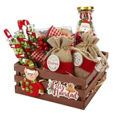 a wooden crate filled with lots of christmas treats