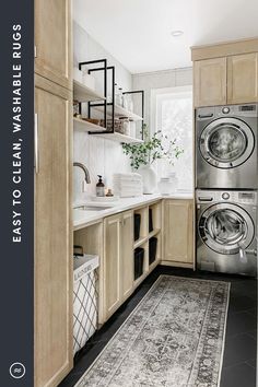 a washer and dryer sitting in a kitchen next to each other on a rug