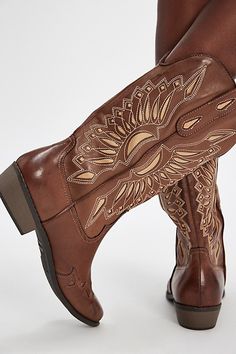 Add true Western flair to your look with these faux leather cowboy boots from Matisse, complete with detailed embroidery and paneling for an authentic touch. **Features:** Tall style, pull-on design, faux leather uppers, pointed toe, dipped toplines, pull straps, embroidered and paneled accents, low block heel **Why We ❤ It:** Perfectly complements anything in your closet from dresses to jeans. | Willa Western Boots by Matisse at Free People in Brown, Size: US 7.5 Detailed Embroidery, Leather Cowboy Boots, Low Block Heels, Boho Clothing, Western Boots, Cowboy Boots, Block Heels, Leather Upper, Cowboy