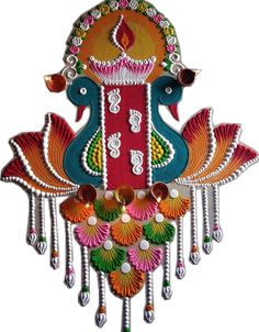 an intricately designed clock with colorful decorations on it