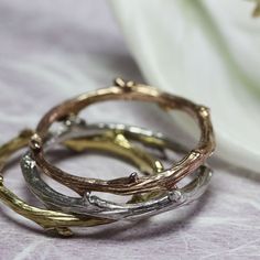 These gold stackable rings are versatile and can be worn in many ways.It's a nice way to create your unique look and express your personality. This gold version of the JazzDesigner Jewelry signature band could make a unique alternative to traditional wedding bands. ***************************************************************************Band Width: approximately 2 mmBand Thickness: 1.8 mm Ring Finish: mirror polishedMetal: 14k Yellow, White and Pink gold**************************************** Gold Nature-inspired Stackable Promise Rings, Nature-inspired Gold Stackable Promise Rings, Gold Stackable Rings, Traditional Wedding Bands, Pink Gold Rings, Alternative Wedding Bands, Twig Ring, Wedding Bands For Her, Gold Rings Stackable