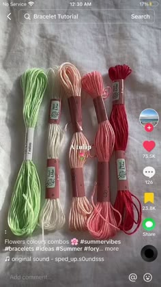 several skeins of yarn are laid out on a sheet with instructions to use them