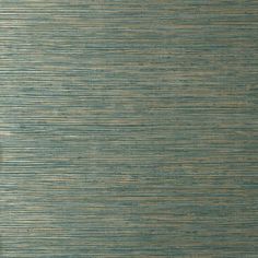 a blue and beige wallpaper with vertical stripes